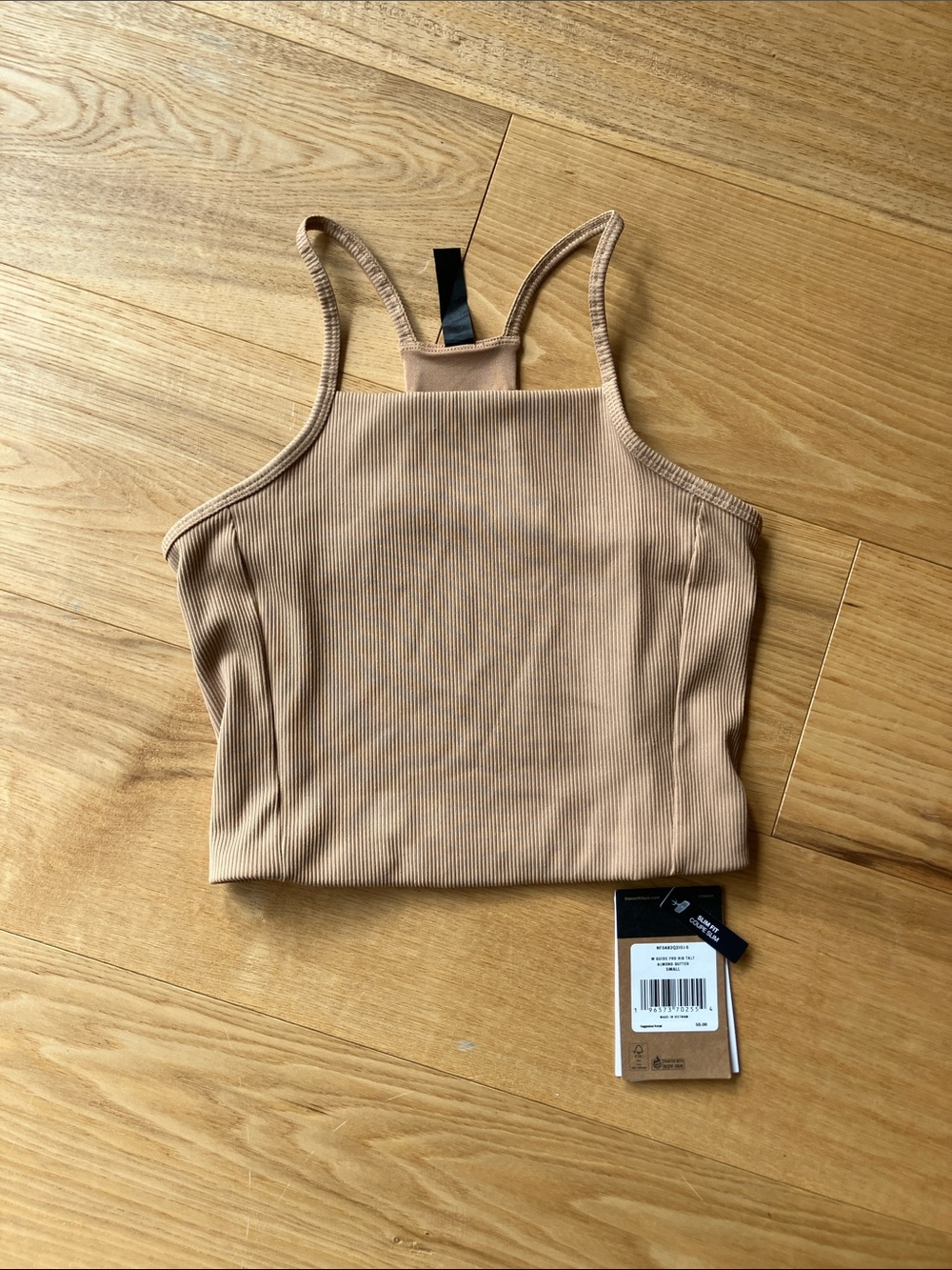 The North Face Guide Forward Ribbed Crop Tank in Almond Butter